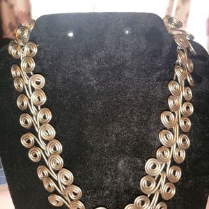 Unique necklace. Very vintage wonderful! Lays great.